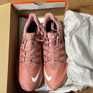 Nike womens size 8. Brand new, still in box. Beautiful dusty pink color.